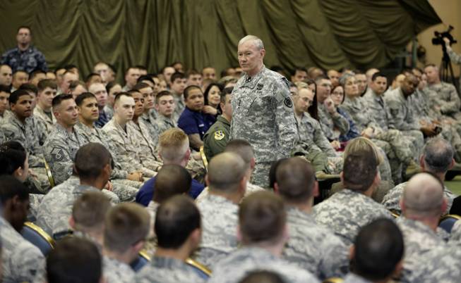 In this April 25, 2013, file photo, Joint Chiefs Chairman Gen. Martin Dempsey speaks to soldiers of the U.S. Armed Forces in Japan at Yokota Air Base on the outskirts of Tokyo. An Associated Press investigation into the military’s handling of sexual assaults in Japan has found a pattern of random and inconsistent judgments in which most offenders are not incarcerated. Instead, commanders have ordered “nonjudicial punishments” that ranged from docked pay to a letter of reprimand.