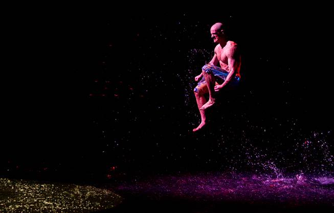 Josh Fried runs to Colby Lemmo ("The Dreamer") during a performance of “Le Reve — The Dream” on Monday, Feb. 10, 2014, at Wynn Las Vegas.
