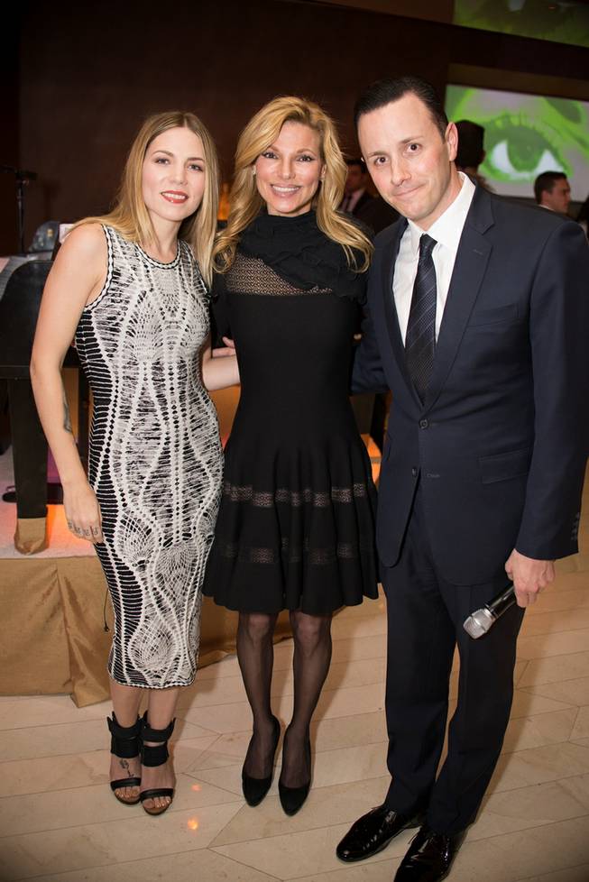 Skylar Grey, Andrea Wynn and Sean Christie attend Andrea’s first-anniversary celebration Wednesday, Feb. 12, 2014, in Encore.