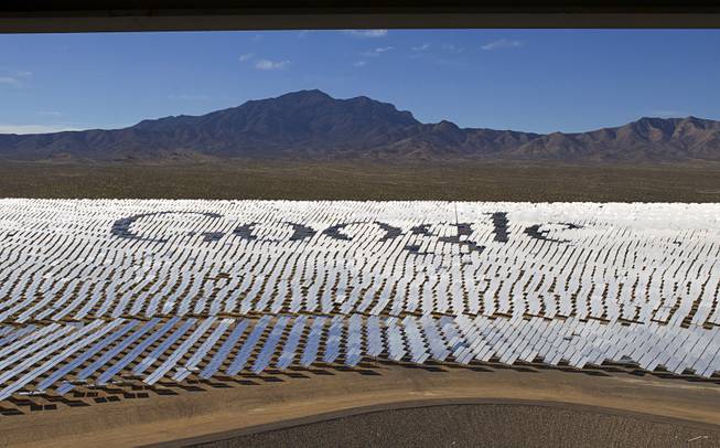 The Google logo is spelled out in heliostats (mirrors that track the sun and reflect the sunlight onto a central receiving point) during a tour of the Ivanpah Solar Electric Generating System in the Mojave Desert in California near Primm, Nev. Feb. 13, 2014. The project, a partnership of NRG, BrightSource, Google and Bechtel, is the world's largest solar thermal facility and uses 347,000 sun-facing mirrors to produce 392 megawatts of electricity, enough energy to power more than 140,000 homes.