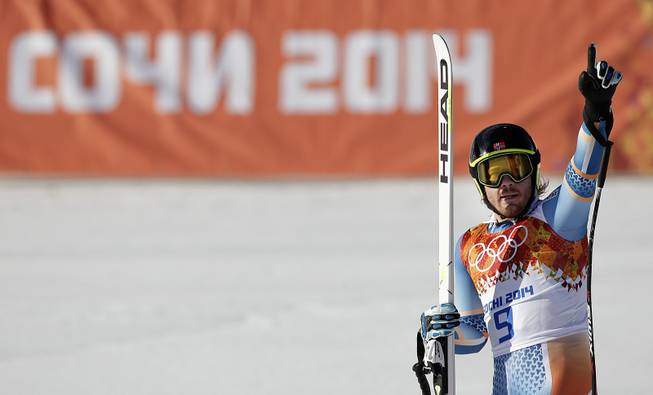 Norway's Kjetil Jansrud gestures from the finish area after finishing the downhill portion of the men's supercombined at the Sochi 2014 Winter Olympics, Friday, Feb. 14, 2014, in Krasnaya Polyana, Russia.