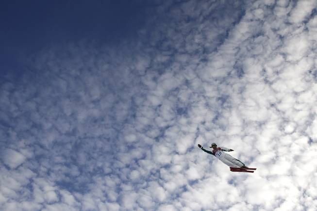 Australia's Samantha Wells catches air during a training session for the women's freestyle skiing aerials at the Rosa Khutor Extreme Park, at the 2014 Winter Olympics, Friday, Feb. 14, 2014, in Krasnaya Polyana, Russia. (AP Photo/Jae C. Hong)