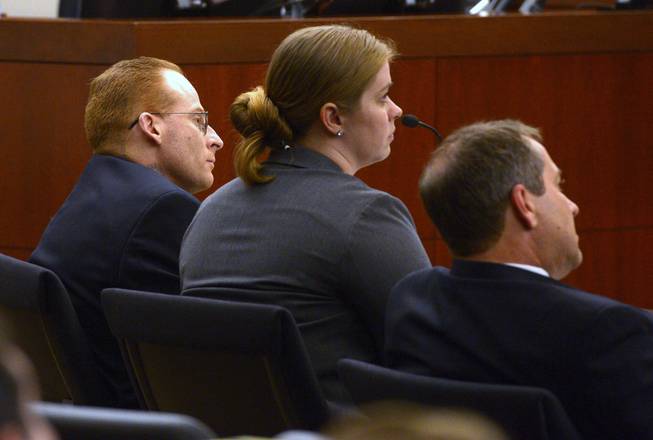 Eric Millerberg, left, and his defense attorneys Haylee Mills, center, and Randall Marshall listen to opening statements by Deputy Weber County prosecuting attorney Chris Shaw, Wednesday, Feb. 12, 2014, in Ogden, Utah. Millerberg has been charged with injecting his 16-year-old baby sitter, Alexis Rasmussen, with a fatal dose of heroin and methamphetamine, then taking his wife and infant daughter along to dump Rasmussen's body near a river.