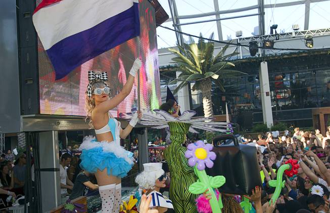 Costumed performers are shown during the Halfway to EDC and first winter pool party at Marquee Dayclub on Sunday, Feb. 16, 2014, in the Cosmopolitan of Las Vegas.