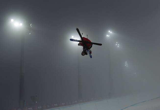 David Wise of the United States gets air during men's freestyle skiing half pipe training at the Rosa Khutor Extreme Park, at the 2014 Winter Olympics, Sunday, Feb. 16, 2014, in Krasnaya Polyana, Russia. 