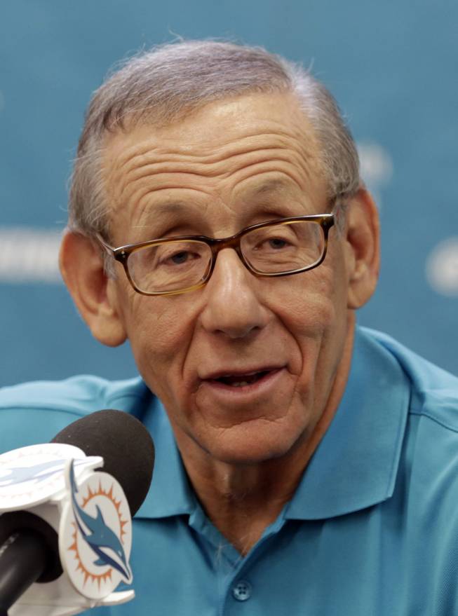 In this Aug. 7, 2013, file photo, Miami Dolphins owner Stephen Ross answers a question during an NFL football media availability in Davie, Fla. Now that the NFL knows the scope of the racially charged Dolphins bullying scandal, the league has been left to grapple with what its next steps should be. Ross wants his organization to lead the way to change the culture.