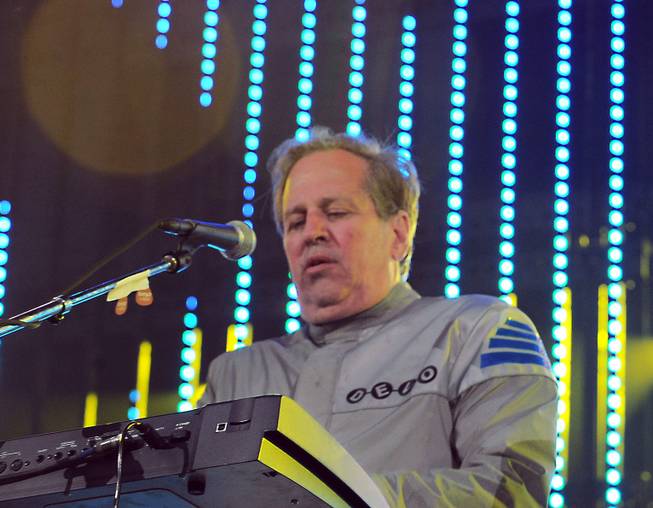 This June 5, 2010, file photo shows Bob Casale performing live at The 2010 KROQ Weenie Roast in Irvine, Calif. Casale, of the band Devo best known for the 1980s hit “Whip It,” died Monday, Feb. 17, 2014, from conditions that led to heart failure, his brother and band member Gerald Casale said.