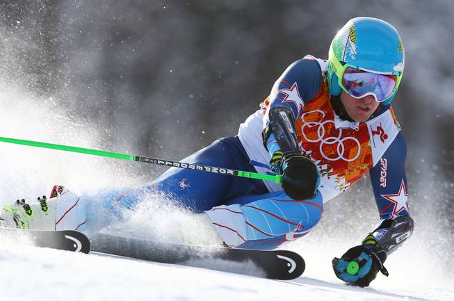Gold medal winner Ted Ligety of the United States skis in the second run of the men's giant slalom the Sochi 2014 Winter Olympics, Wednesday, Feb. 19, 2014, in Krasnaya Polyana, Russia.