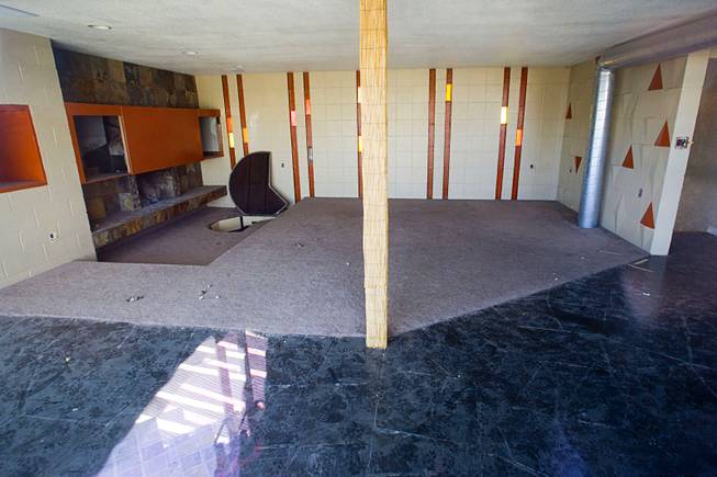 A view of a a second-floor room in a home, famed for being a former Rat Pack hangout, near Eastern Avenue and Desert Inn Road Thursday, Feb. 20, 2014. The door in the floor, back left, leads to a spiral staircase.