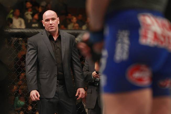 Dana White stands in the octagon after the Ronda Rousey Sara McMann fight at UFC 170 Saturday, Feb. 22, 2014 at the Mandalay Bay Events Center.