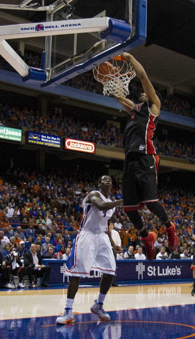UNLV's Khem Birch dunks in the Rebels' 91-90 overtime loss to Boise State at Taco Bell Arena in Boise on Saturday, Feb. 22, 2014.