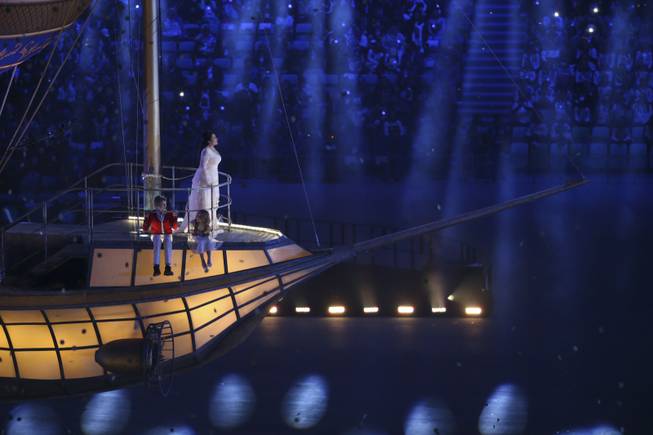 Opratic Soprano Hibla Gerzmava sings aboard a floating ship with other performers during the closing ceremony for the 2014 Winter Olympics at Fisht Olympic Stadium in Sochi, Russia, Feb. 23, 2014. (Josh Haner/The New York Times)