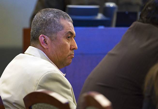 Armando Vergara-Martinez appears in court during his trial at the Clark County Regional Justice Center Tuesday, Feb. 25, 2014. Martinez is accused of attacking Maria Gomez with a machete in the parking lot of a North Las Vegas convenience store in 2012.