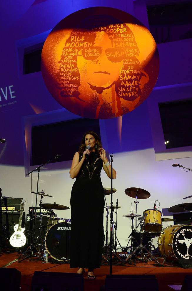 Elizabeth Blau speaks during the Kerry Simon "Simon Says Fight MSA" benefit concert at The Keep Memory Alive Center in Las Vegas on Feb. 27, 2014.