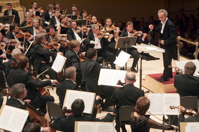 Yuri Temirkanov, artistic director and principal conductor of the St. Petersburg Philharmonic Orchestra, leads the orchestra in the performance of Tchaikovsky's Symphony No. 5, Thursday, Sept. 29, 2005, during opening night at Carnegie Hall in New York. 