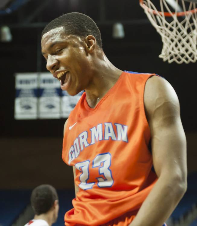 Nick Blair lets out a triumphant yell after a one-handed dunk Thursday, Feb. 27, 2014 as Bishop Gorman defeats Reno 68-27 in the semifinals of the Nevada State Championships at Lawlor Events Center in Reno.