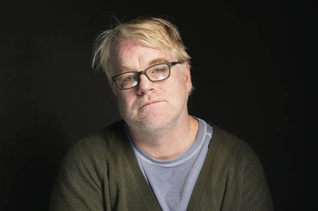 In this Jan. 19, 2014, file photo, Philip Seymour Hoffman poses for a portrait at The Collective and Gibson Lounge Powered by CEG, during the Sundance Film Festival, in Park City, Utah.