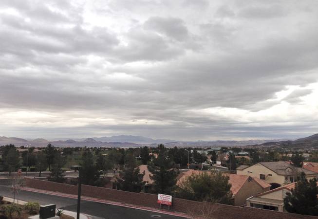 Clouds loom over the Las Vegas Valley threatening some much needed rain Friday, Feb. 28, 2014.