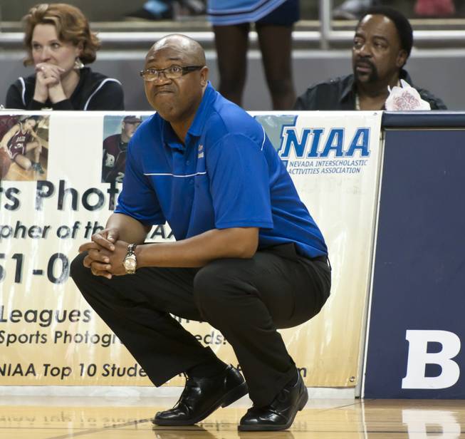 Head coach Freddie Banks looks on is disappointment as the clock winds down Friday, Feb. 28, 2014 as Bishop Gorman defeated Canyon Springs 71-58 in the Nevada state championship game at Lawlor Event Center in Reno.