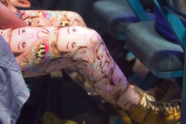 A fan wears tights with images of Miley Cyrus at the Miley Cyrus concert at MGM Grand Garden Arena on Saturday, March 1, 2014, in Las Vegas.