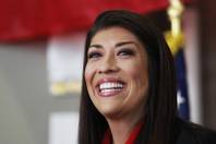 Lucy Flores smiles as she announces her candidacy for lieutenant governor Saturday, March 1, 2014, at the College of Southern Nevada's Cheyenne campus.