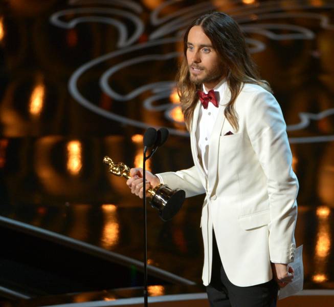 Jared Leto accepts the award for best actor in a supporting role for “Dallas Buyers Club” during the Oscars at the Dolby Theatre on Sunday, March 2, 2014, in Los Angeles.