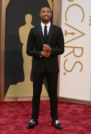 Michael B. Jordan arrives at the Oscars on Sunday, March 2, 2014, at the Dolby Theatre in Los Angeles.  (Photo by Jordan Strauss/Invision/AP)