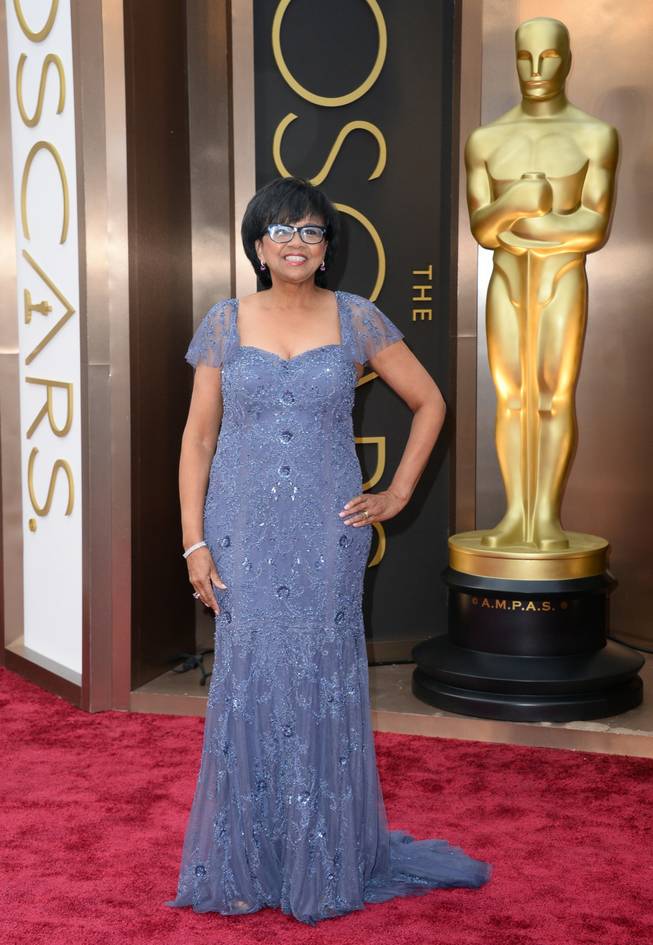 Cheryl Boone Isaacs arrives at the Oscars on Sunday, March 2, 2014, at the Dolby Theatre in Los Angeles.  (Photo by Jordan Strauss/Invision/AP)