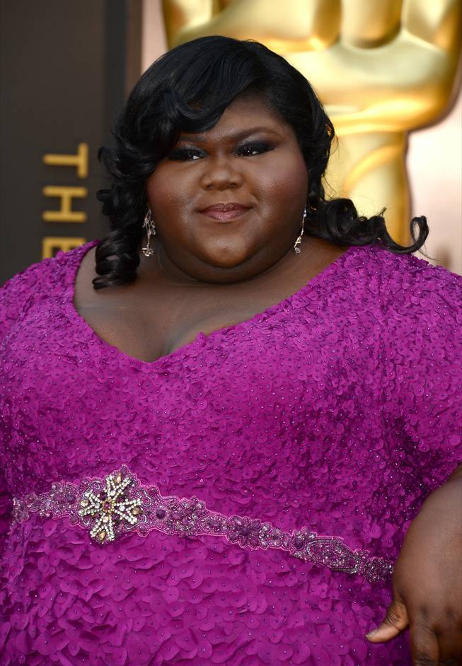 Gabourey Sidibe arrives at the Oscars on Sunday, March 2, 2014, at the Dolby Theatre in Los Angeles.  (Photo by Jordan Strauss/Invision/AP)