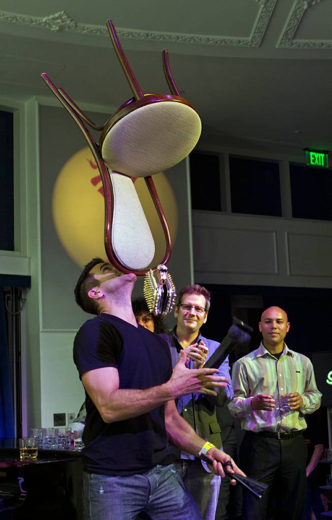 Juggler Jeff Civillico balances a chair on his chin and juggles during Las Vegas Weekly's Unscripted Party featuring Stifler in the Havana Room on Tuesday, March 4, 2014, at the Tropicana.