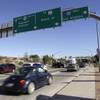 Motorists roll through a traffic light on southbound U.S. 93 as they approach Interstate 40 in Kingman, Ariz., on Friday, Nov. 8, 2013. 