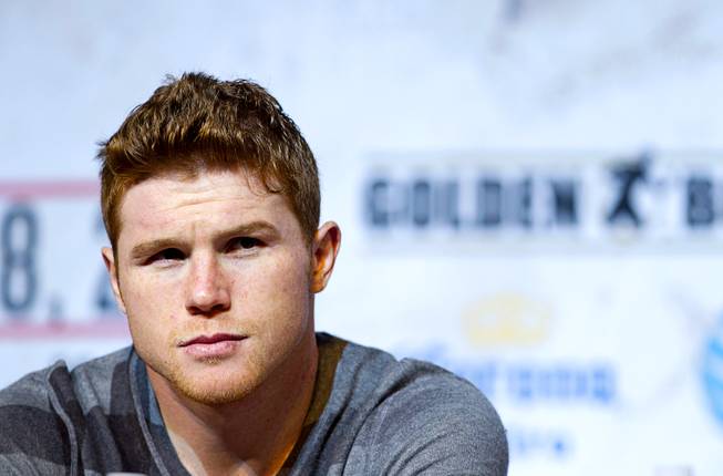 Super welterweight boxer Canelo Alvarez attends a news conference at the MGM Grand Thursday, March 6, 2014. Alvarez and Alfredo Angulo, both of Mexico, will fight at the MGM Grand Garden Arena on Saturday. Alvarez is a former WBC and WBA 154 lb. champion.