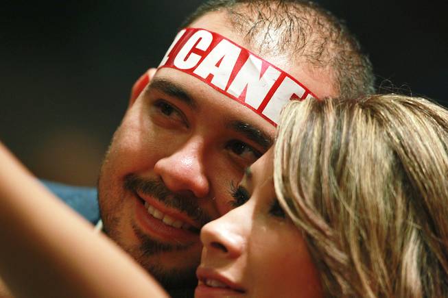 Fans of Saul "Canelo" Alvarez take a photo of themselves before during his super welterweight fight against Alfredo Angulo at the MGM Grand Garden Arena Saturday, March 8, 2014.