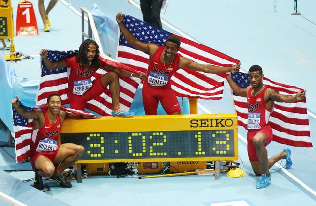 United States relay team, from left, Kind Butler, David Verburg, Calvin Smith and Kyle Clemons celebrate after winning the 4x400m relay with a new world record during the Athletics World Indoor Championships in Sopot, Poland, on Sunday, March 9.