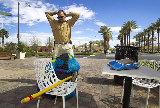 Robert Sorensen, 27, prepares for a walk from Henderson to Israel Monday, March 10, 2014. Sorensen said he is not a religious man but that it was a "spiritual" journey. Sorensen estimated the trip to be 16,500 miles.