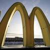 In this Tuesday, Jan. 21, 2014, file photo, the McDonald's Golden Arches logo at a McDonald's restaurant is covered with snow in Robinson Township, Pa.