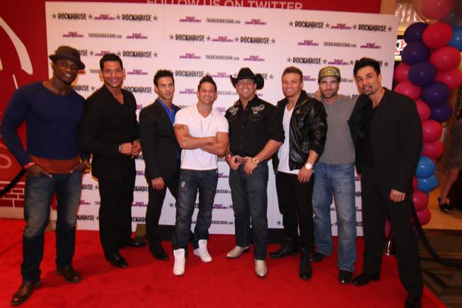 Jeff Timmons, in the white T-shirt, and Men of the Strip attend the first-anniversary celebration of Rockhouse on Tuesday, March 11, 2014, at the Venetian.