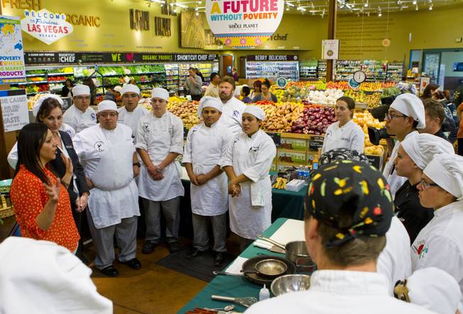 Students are instructed on the competition rules preceding the Culinary Collision at the Whole Foods Market in Town Square on Thursday, March 13, 2014.