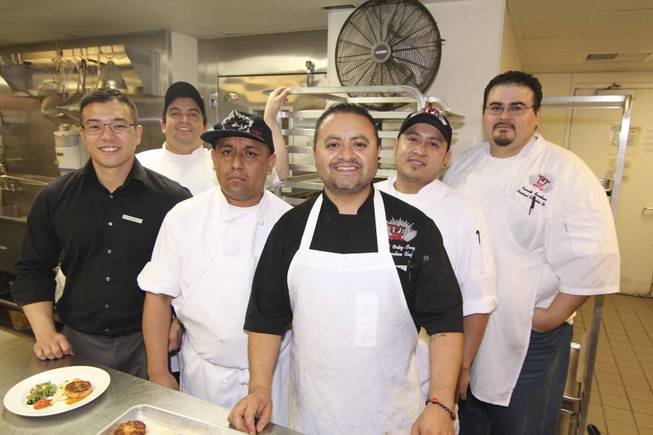 Chef Saul, center front, and staff at the Viva Max! benefit dinner for Max Jacobson hosted at Luxor's Tacos & Tequila restaurant Thursday, March 13, 2014.  All proceeds went toward the recovery of Max Jacobson.