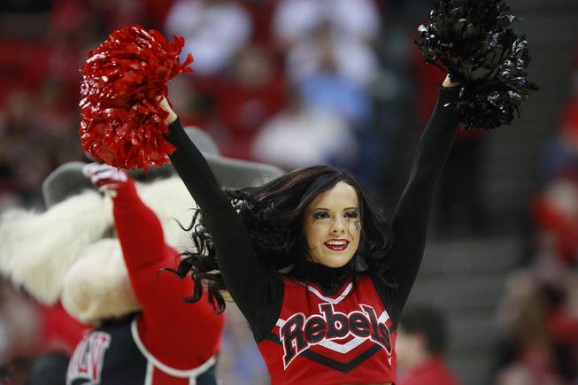A UNLV cheerleader performs during their Mountain West Conference semifinal game against San Diego State  Friday, March 14, 2014 at the Thomas & Mack Center. The #8 ranked San Diego State Aztecs won 59-51 to advance to the finals.