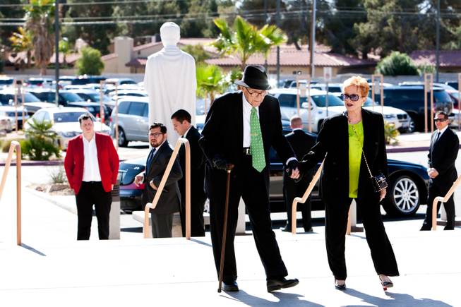 Long-time friends and Las Vegas notables arrive for the memorial mass for John Davis "Jackie" Gaughan held at St. Viator Catholic Church in Las Vegas on St. Patrick's Day, March 17, 2014.  Jackie Gaughan, 93, passed away March 12, 2014.