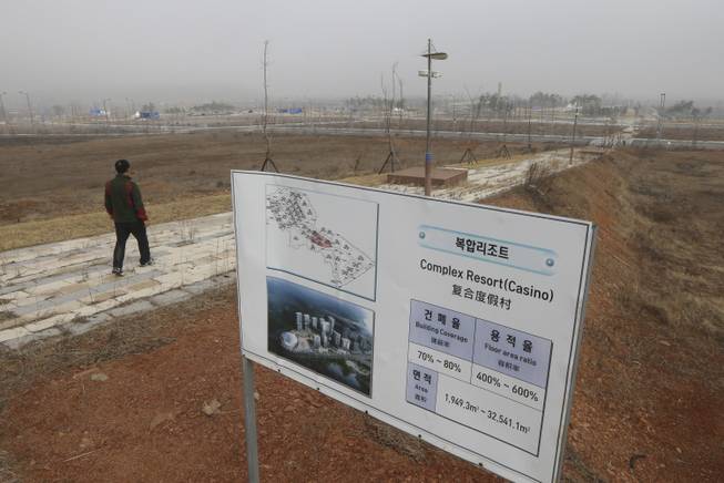 A signboard for a casino is set at its planned site in Incheon, west of Seoul, South Korea, Tuesday, March 18, 2014.