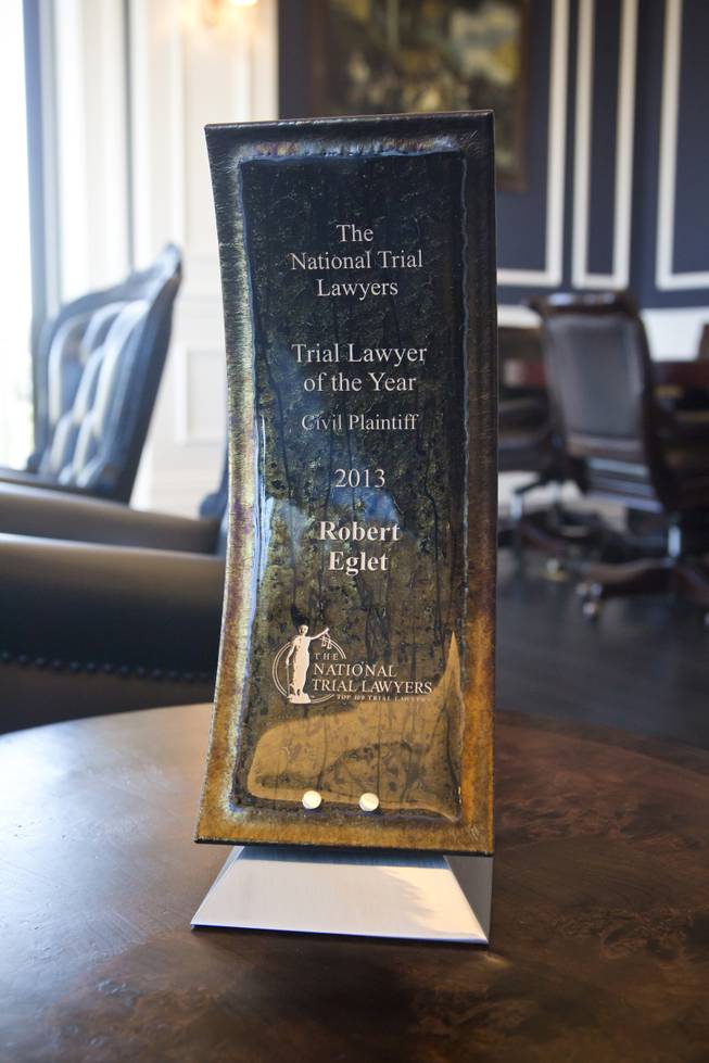 Robert Eglet's Trial Lawyer of The Year award is on display in the lobby at the Robert Eglet Advocacy Center Wednesday, March 19, 2014.