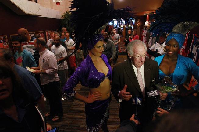 Former Las Vegas mayor Oscar Goodman talks to television reporters outside the LVH sports book during the second round of the NCAA basketball tournament Thursday, March 20, 2014.