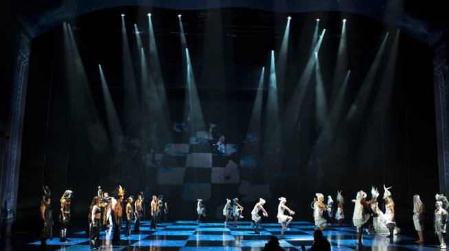 Cirque performers form a human chess board during the One Night for ONE DROP dress rehearsal in the Michael Jackson ONE Theatre on Thursday, March 20, 2014.