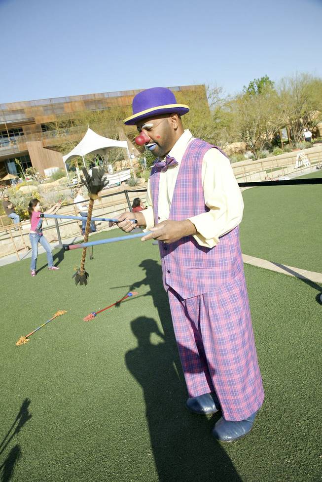 A juggler performs at Run Away with Cirque du Soleil 5K Run and One-Mile Fun Walk at the Springs Preserve on Saturday, March 15, 2014.