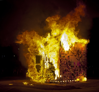 Life Cube, an interactive community art installation, goes up in flames in downtown Las Vegas, Friday March 21, 2014. The Life Cube, a creation of artist Scott Cohen, was a 24-by-24-foot plywood cube, painted by artists and filled with notes from thousands of people.