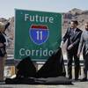 From left, Arizona Department of Transportation Director John Halikowski, Arizona Gov. Jan Brewer, Nevada Gov. Brian Sandoval, Steven Horsford, D-Nev., and Nevada Department of Transportation Director Rudy Malfabon unveil a sign marking the corridor for the future Interstate 11 between Phoenix and Las Vegas, Friday, March 21, 2014, at the Hoover Dam in Arizona. It was a symbolic effort meant to keep up momentum on the project, which is coming of age in an era of scarce highway funding.