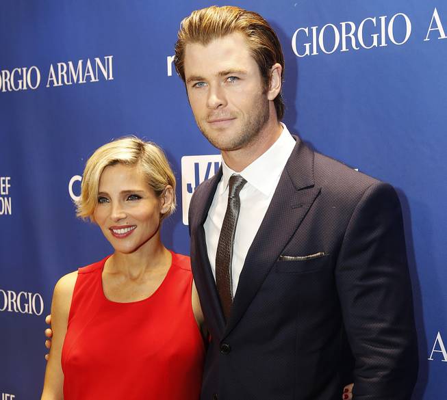 Elsa Pataky, left, and Chris Hemsworth arrive at the Sean Penn & Friends Help Haiti Home Gala at the Montage Hotel in Beverly Hills, Calif., Jan. 11, 2014. Hemsworth and his wife, Pataky, have welcomed not one, but two sons. 
