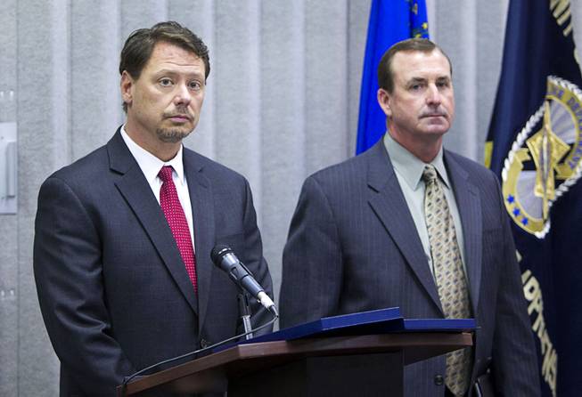 Clark County School District Superintendent Pat Skorkowsky, left, and Metro Police Capt. Brett Primas listen to a question during a news conference at CCSD Police Headquarters in Henderson Monday, March 24, 2014. Officials addressed questions about an investigation into the possible misuse of funds by employees in the Adult English Language Acquisition Services (AELAS) department.